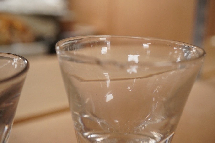 Two late 18th century toastmaster’s glasses, tallest 11.5cm, one af